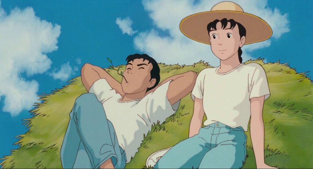 Taeko and Toshio relaxing in the field